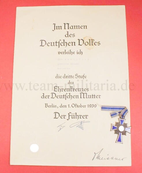 Verleihungsurkunde zum Mutterkreuz III.Stufe mit Mutterkreuz der Elsa Schöpflin