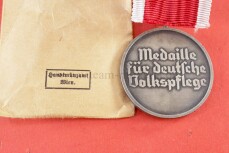 Medaille f&uuml;r deutsche Volkspflege mit T&uuml;te