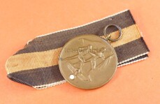 Medaille 1.Oktober Sudetenland am langen orangefarbigen Band