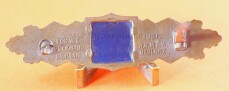 Nahkampfspange in Bronze mit blauer Platte  (A.G.M.u.K) -...