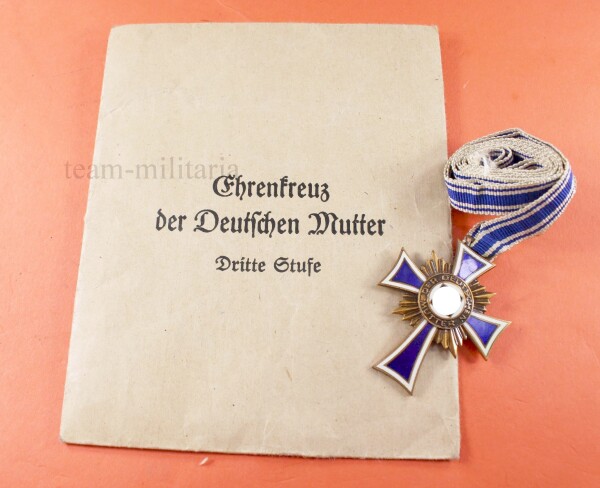 Mutterkreuz in Bronze Tüte mit Band - Ehrenkreuz der deutschen Mutter III.Stufe - MINT CONDITION